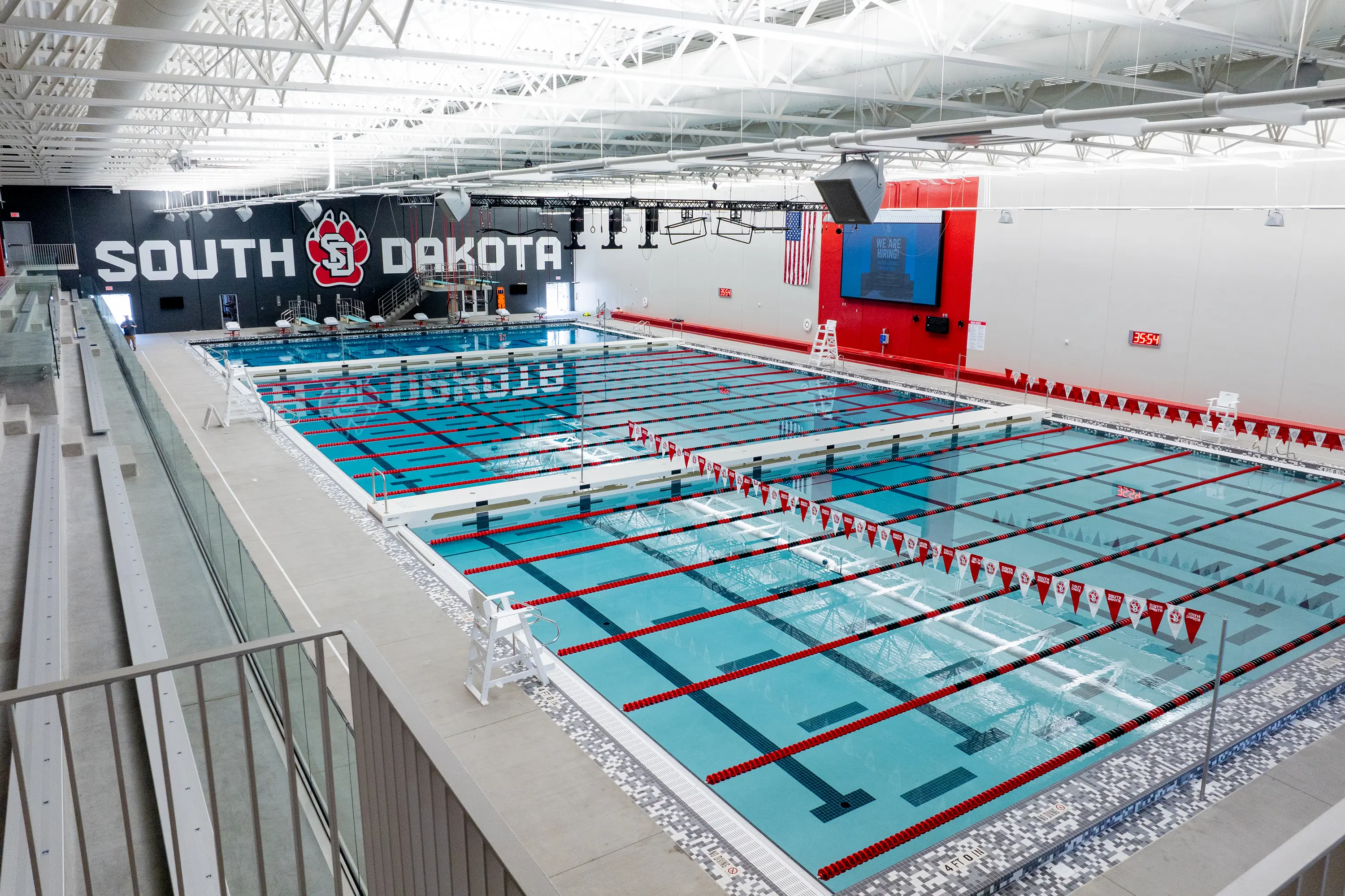 Usd Natatorium Wellness Center 16 Interior overview of the natatorium featuring the 50-meter pool with lane lines.