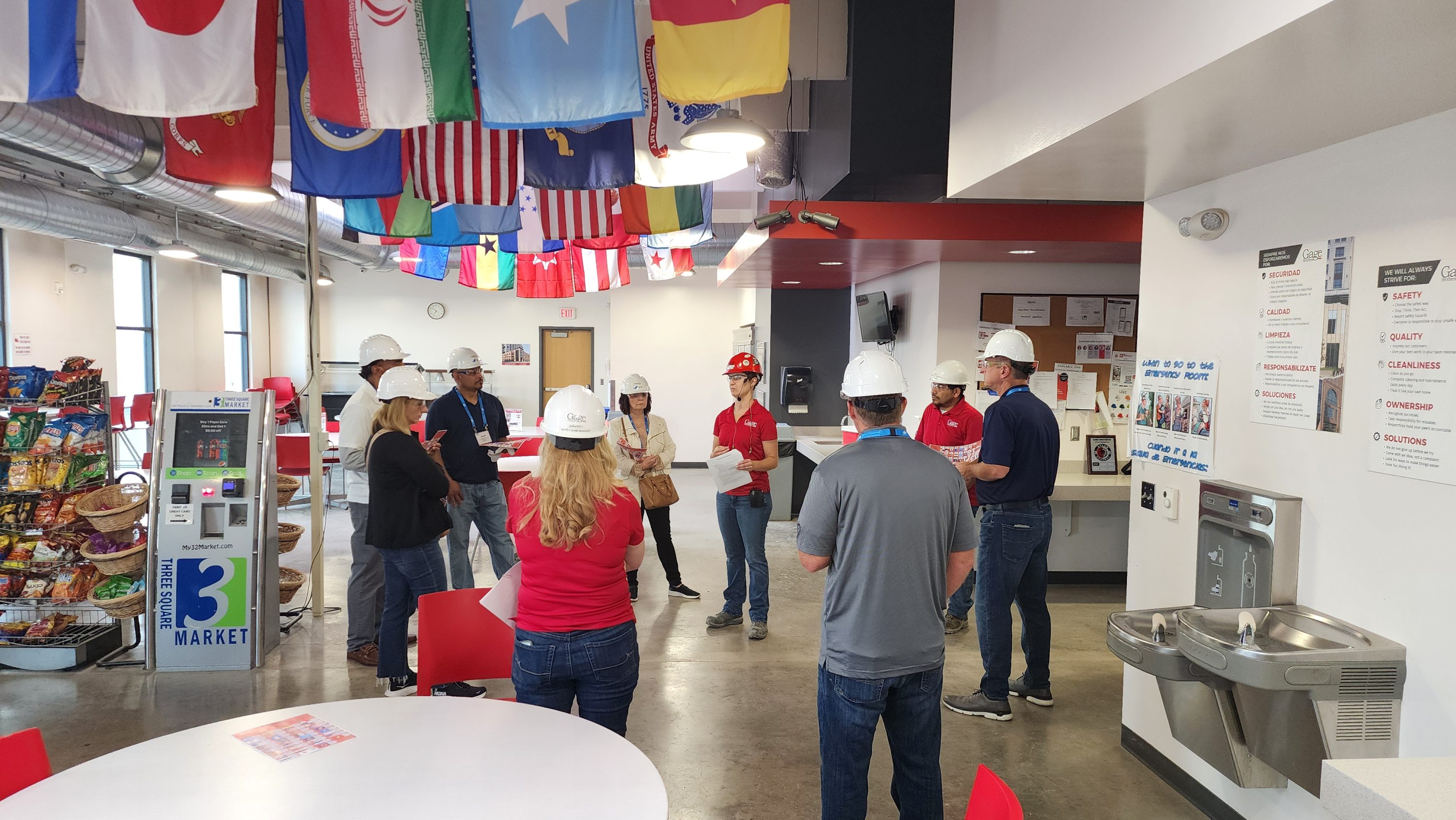 Company culture and diversity showcased by hanging flags representing our team members.